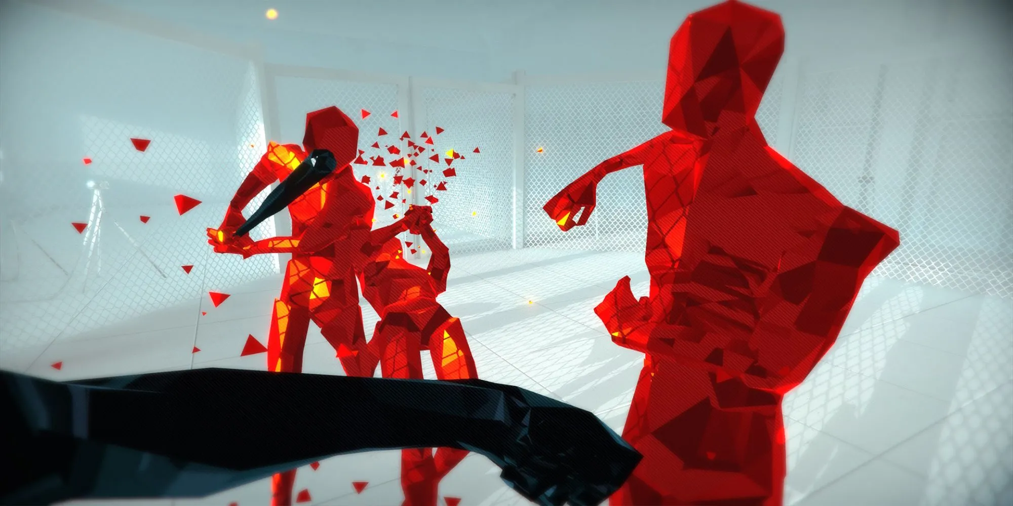Cảnh gameplay game Superhot với đồ họa đặc trưng, thể hiện khả năng làm chậm thời gian để hành động chính xác