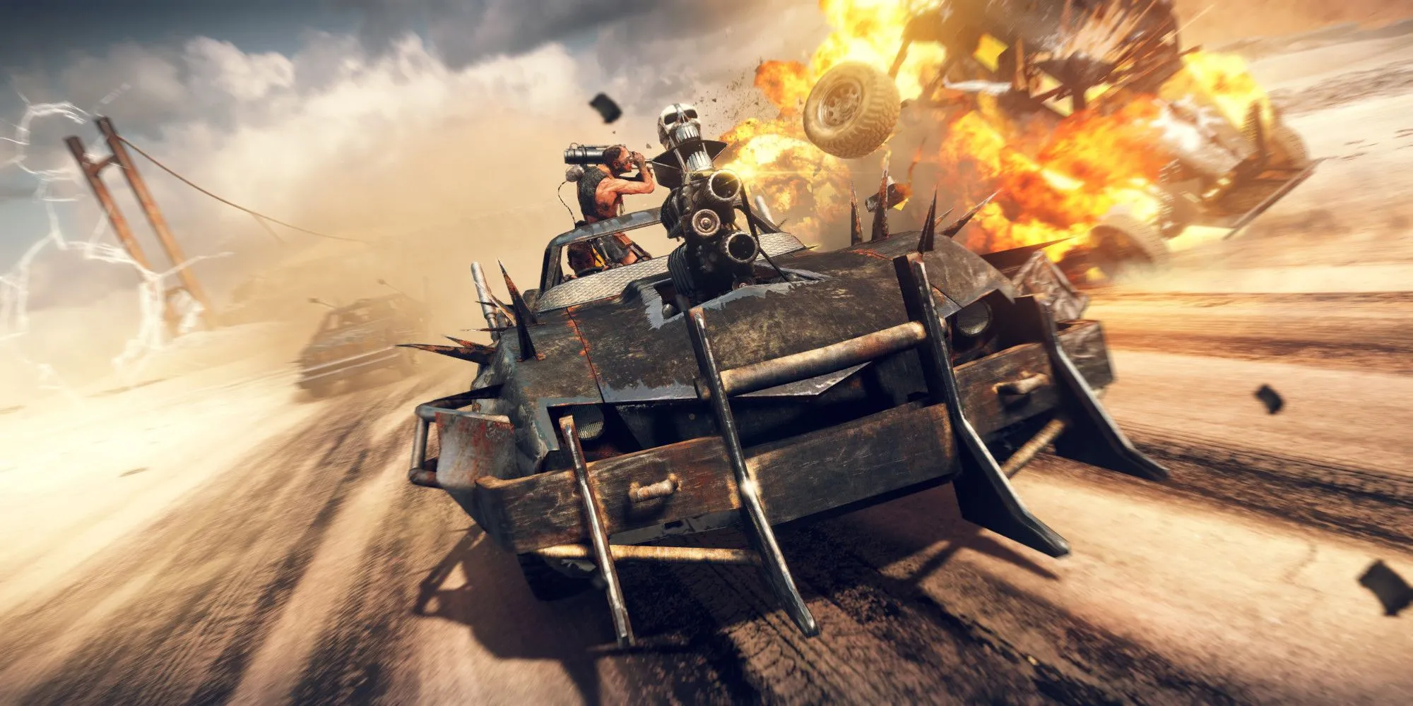 Mad Max lái xe và cho nổ tung một phương tiện khác
