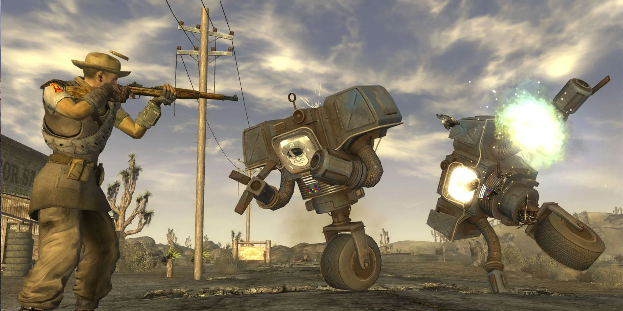 Nhân vật chĩa súng vào robot trong game Fallout: New Vegas