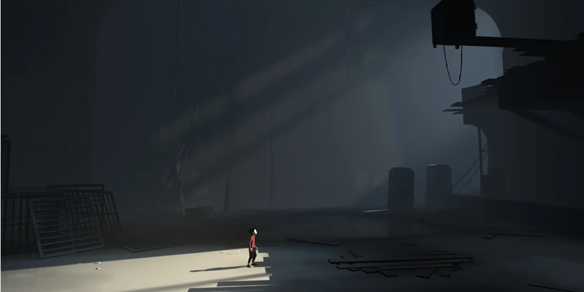 Nhân vật chính né tránh nguy hiểm trong môi trường tăm tối, u ám của game INSIDE.