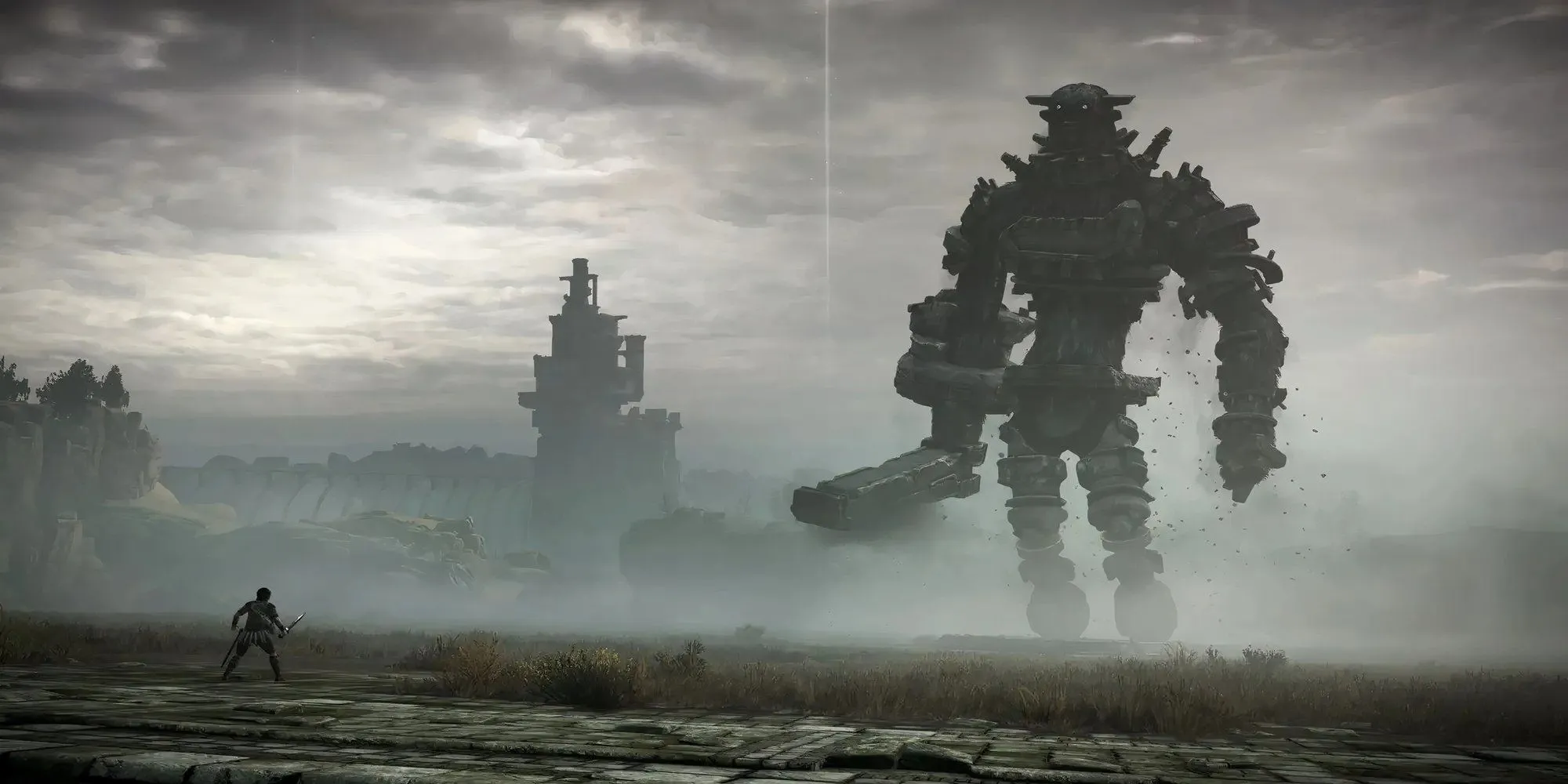 Nhân vật chính Wander đối mặt với một trong những colossi khổng lồ trong Shadow of the Colossus bản làm lại 2018