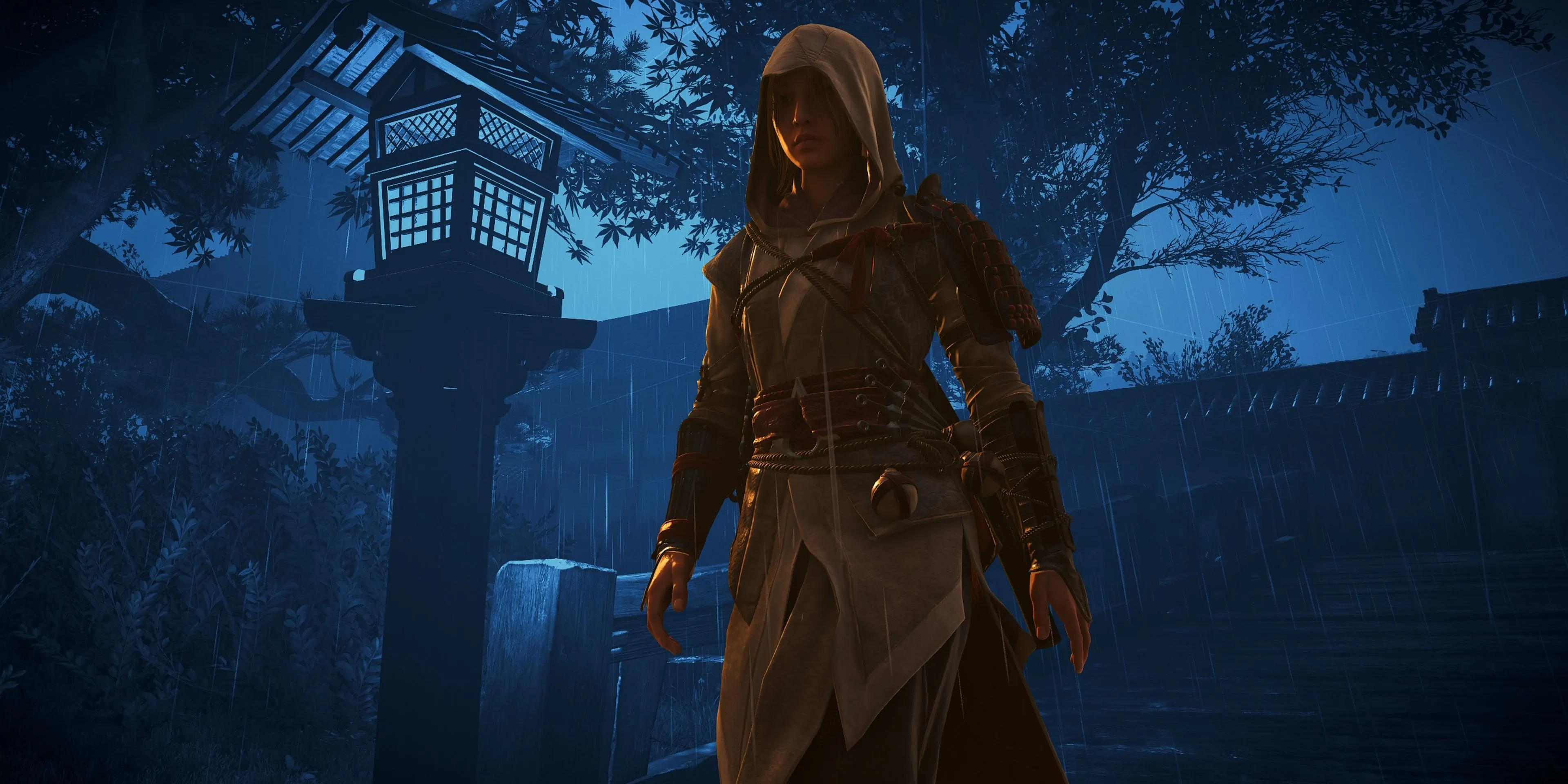 Naoe đứng trên nóc nhà quan sát cảnh vật trong Assassin's Creed Shadows