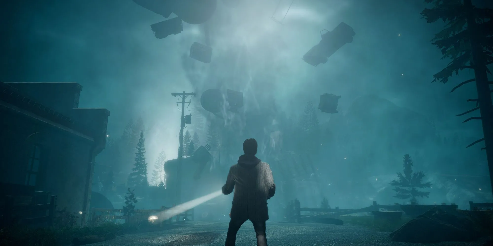 Nhân vật Alan Wake đứng cầm đèn pin trong môi trường siêu nhiên