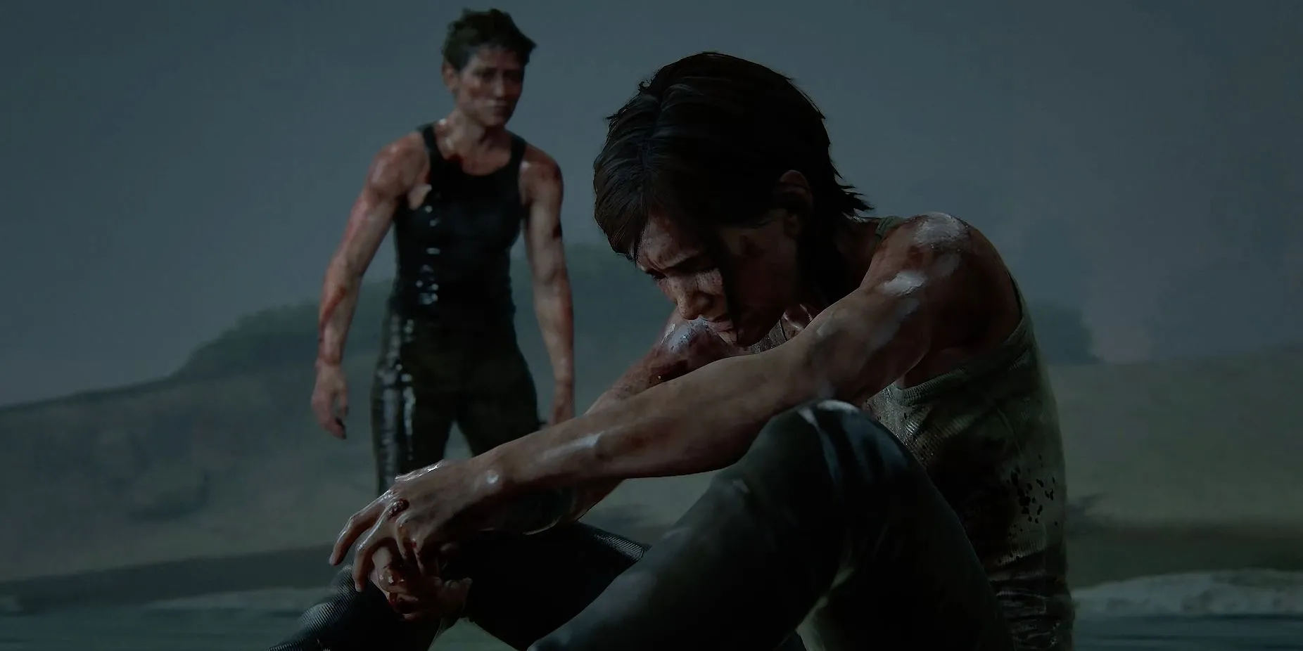 Abby nhìn Ellie đang ngồi trên mặt đất trong The Last Of Us Part 2