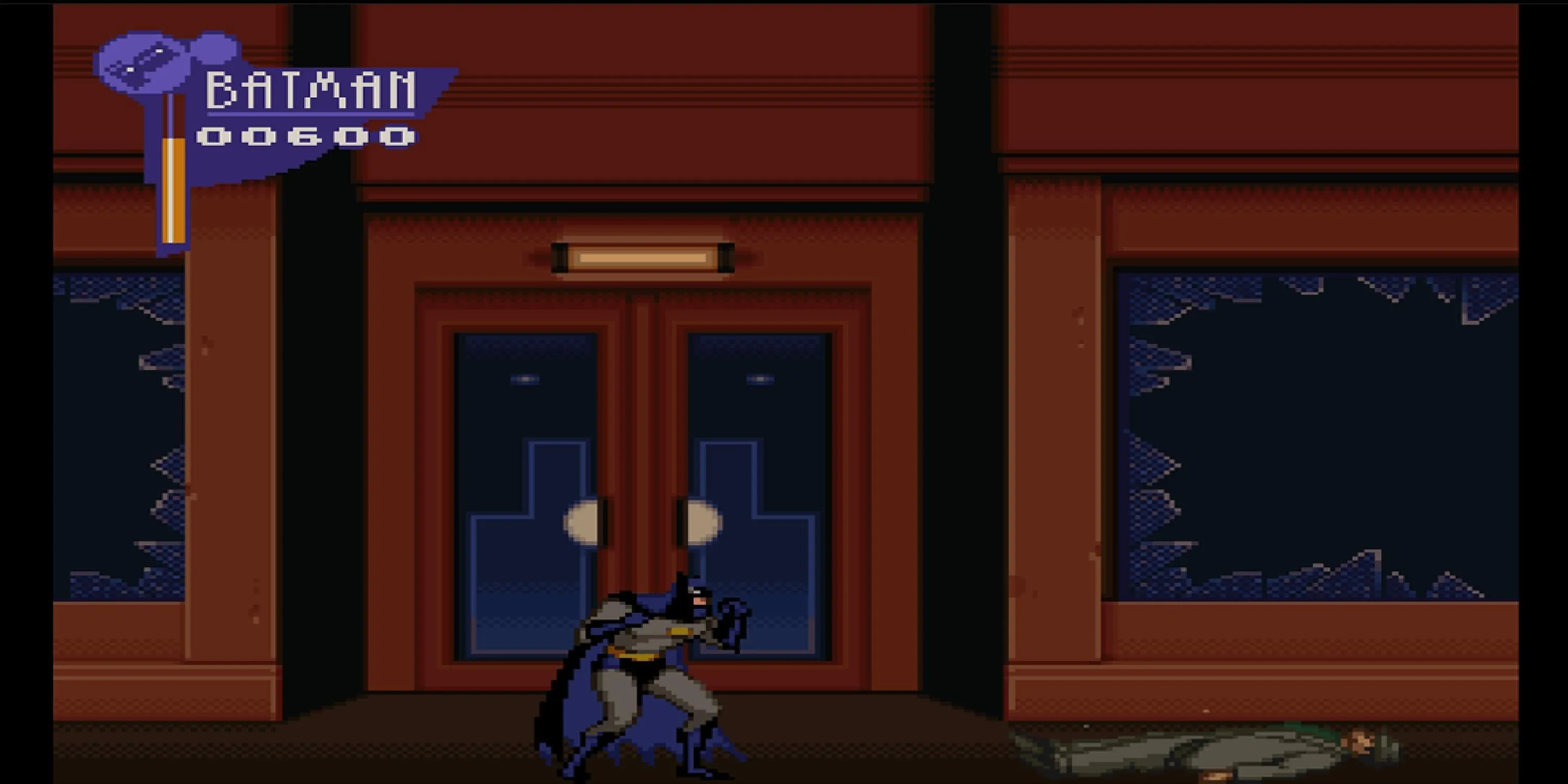 Batman sau khi chiến đấu với kẻ thù trên đường trong The Adventures of Batman and Robin