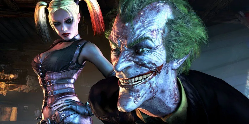 Joker ốm yếu cười trước màn hình với Harley Quinn trong Batman Arkham City