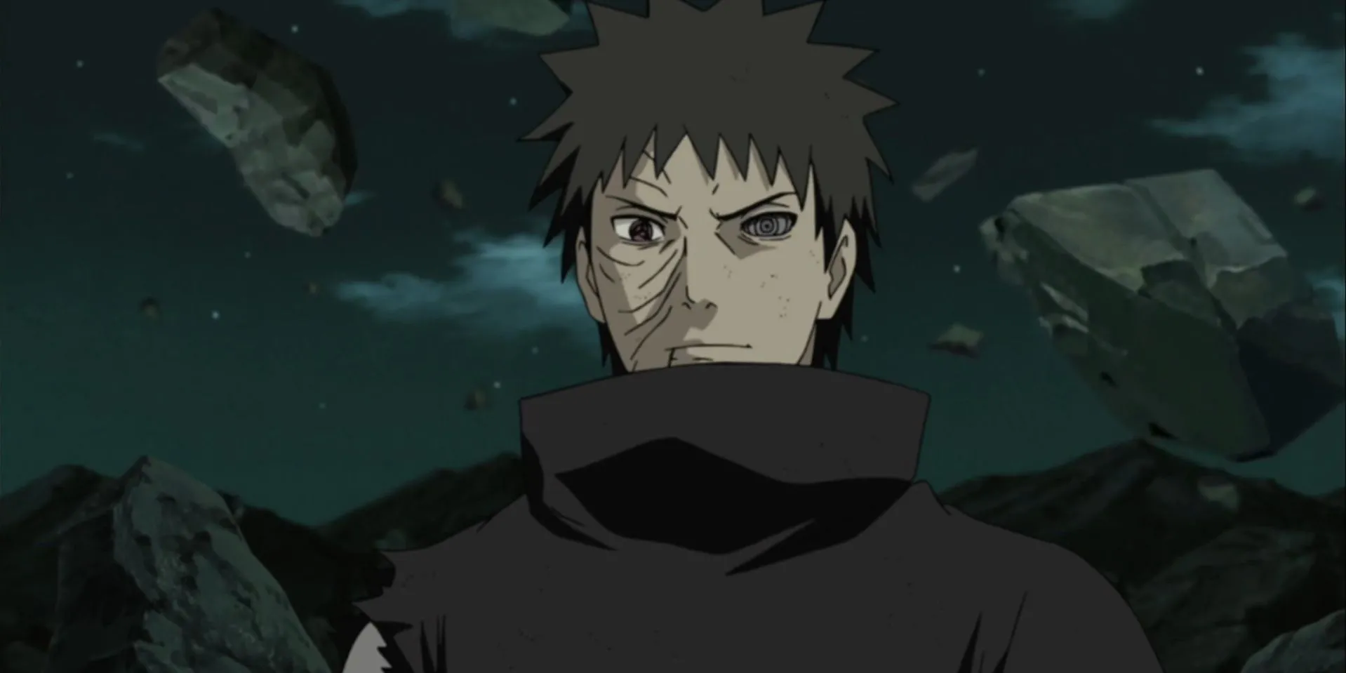 Obito Uchiha trong chiếc mặt nạ, biểu tượng cho sự thao túng và ảo ảnh kiểm soát của hắn