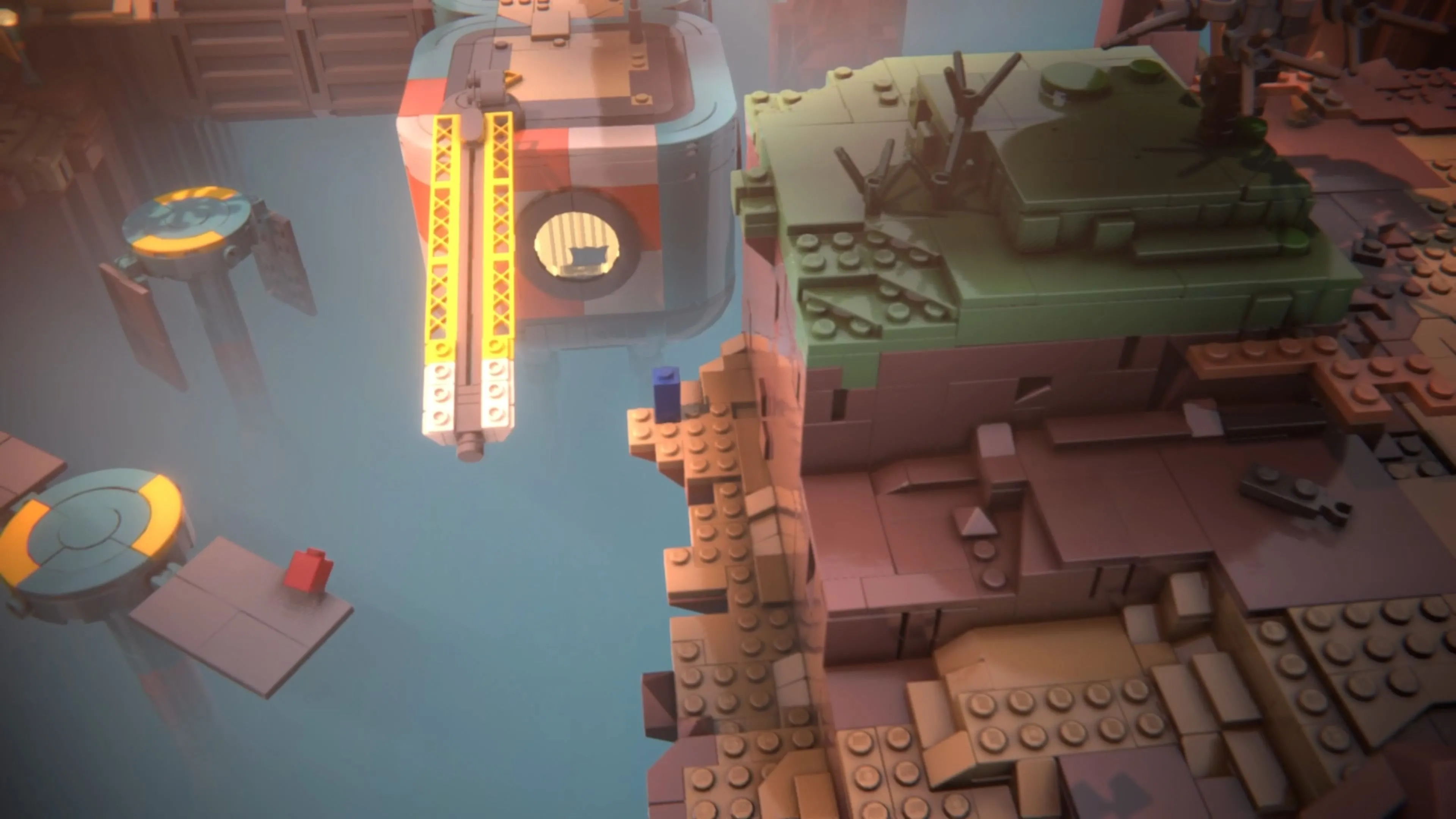 Red và Blue trong LEGO Voyagers kéo khối gạch vàng trên tháp để tạo cầu.