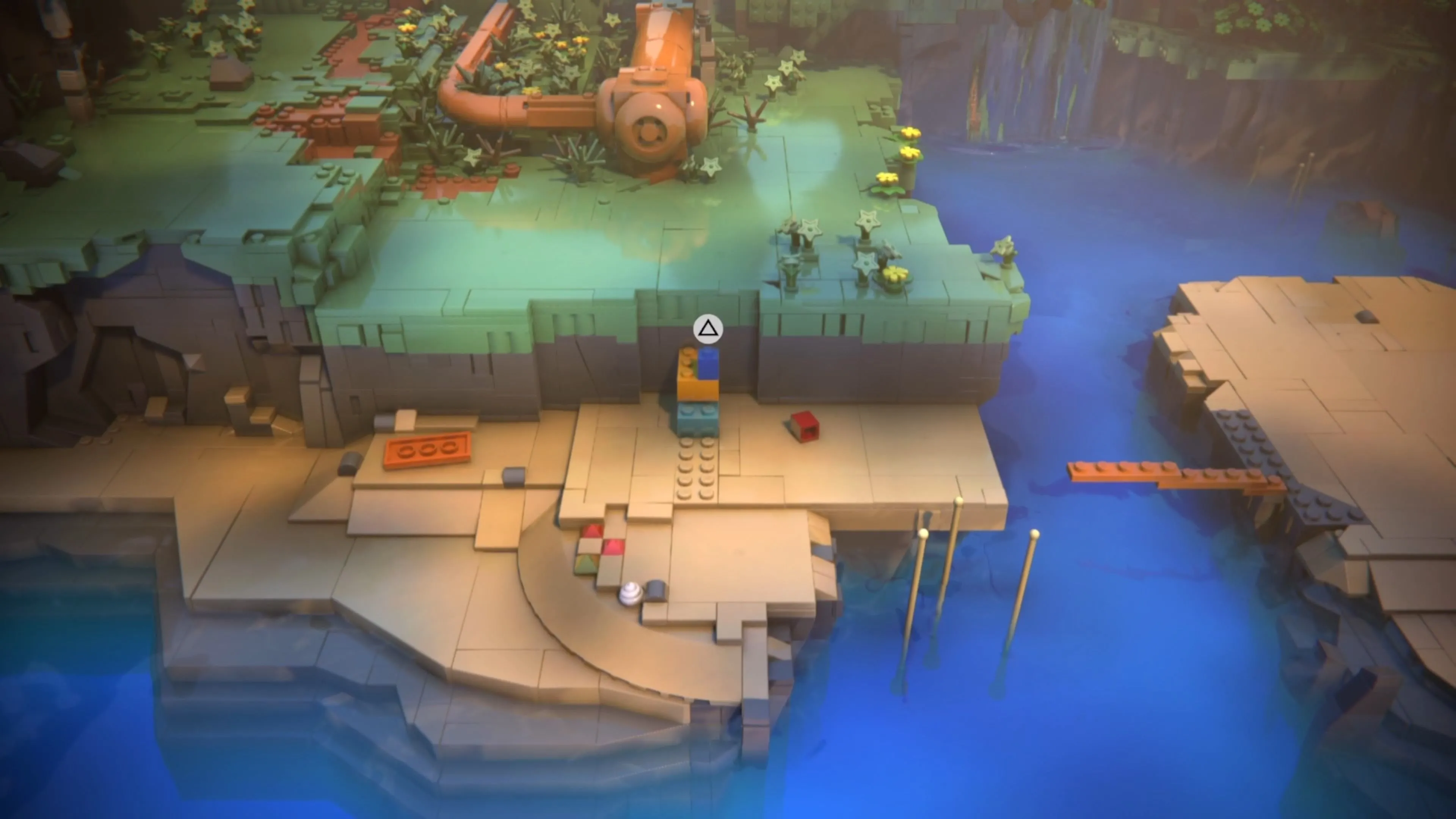 Red và Blue trong LEGO Voyagers thu thập các khối gạch teal và vàng để xây cầu thang.